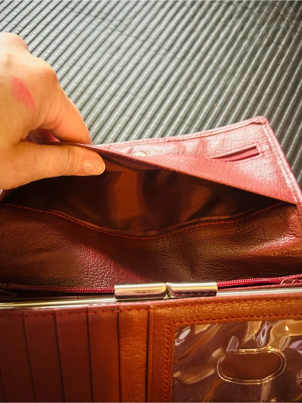 Wilson’s leather, maroon Leather trifold, wallet with Gold Accent